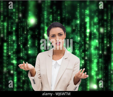 Composite image of confused businesswoman standing over white background Stock Photo