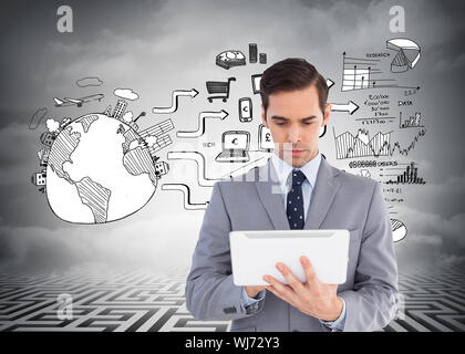 Composite image of businessman holding a tablet computer Stock Photo