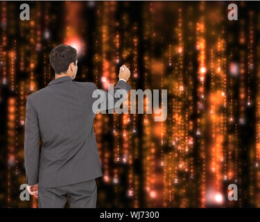 Composite image of businessman standing back to camera writing with marker on white background Stock Photo