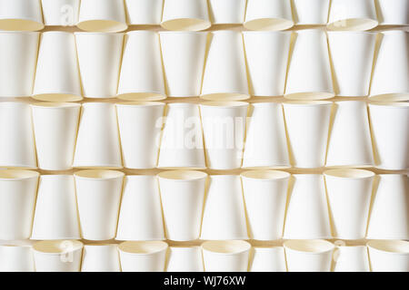 Background pattern of white coffee paper cup. Conceptual with copy space Stock Photo