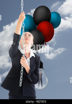 Asian business woman pulling chain isolated over white background Stock ...