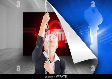 Composite image of blonde businesswoman pulling a chain Stock Photo