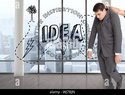 Composite image of businessman hanging Stock Photo