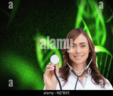 Composite image of happy brunette doctor using stethoscope Stock Photo