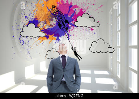 Composite image of businessman standing Stock Photo