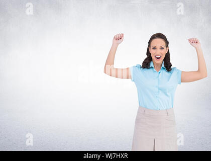 Composite image of victorious stylish businesswoman posing Stock Photo