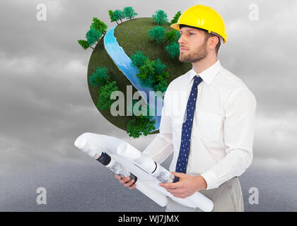 Composite image of thoughtful young architect posing Stock Photo