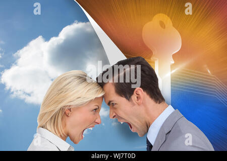 Composite image of colleagues quarreling head against head Stock Photo