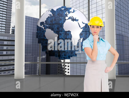 Composite image of thoughtful attractive architect posing Stock Photo