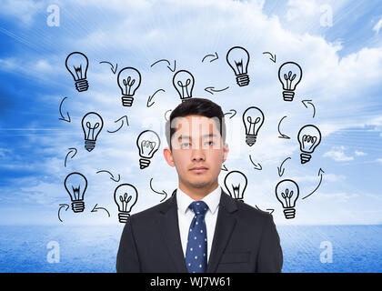 Composite image of light bulbs graphic on bright horizon Stock Photo