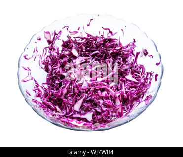 red cabbage salad with vegetable oil in glass bowl cutout on white background Stock Photo