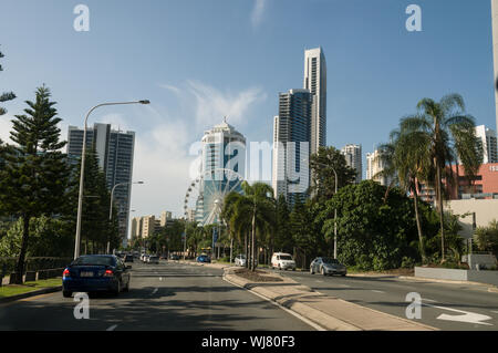 One of the main streets in Surfers Paradise. The Q1 tower, the tallest residential building in Queensland on the Gold Coast in Queensland, Australia. Stock Photo