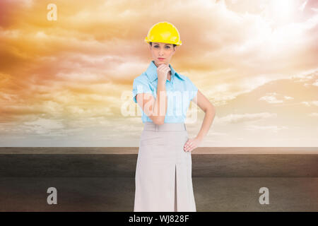 Composite image of thoughtful attractive architect posing Stock Photo