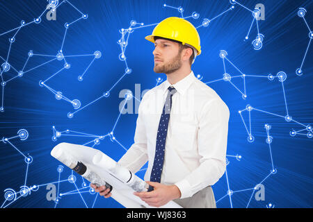 Composite image of thoughtful young architect posing Stock Photo
