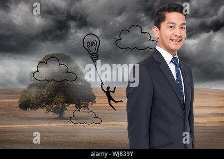 Composite image of light bulb balloon over cloudy landscape Stock Photo