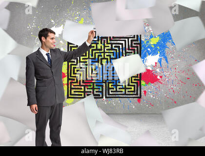 Composite image of happy attractive businessman touching Stock Photo