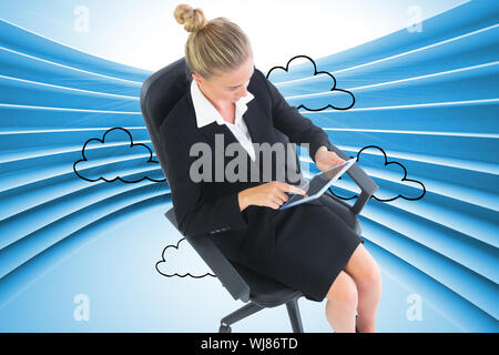 Composite image of blonde businesswoman sitting on swivel chair with tablet Stock Photo