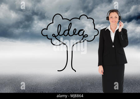 Composite image of good looking young woman in black suit using headphones and posing while standing Stock Photo