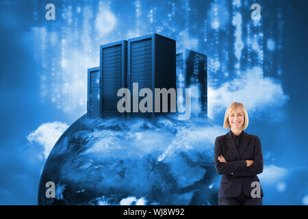 Composite image of attractive friendly businesswoman smiling at the camera in a meeting Stock Photo