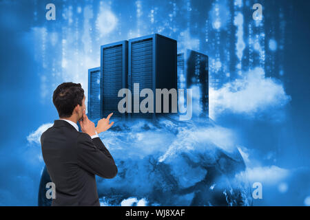 Composite image of thoughtful asian businessman pointing Stock Photo