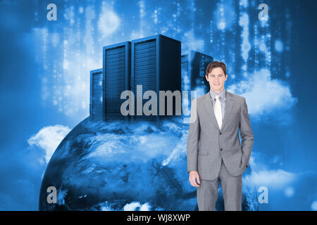 Composite image of portrait af a charismatic businessman standing in front of the camera Stock Photo