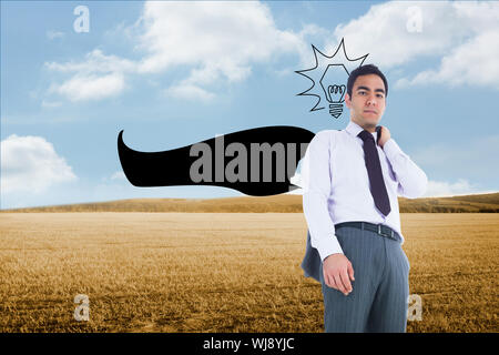 Composite image of unsmiling businessman standing Stock Photo
