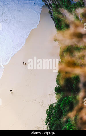 Landscape of beautiful beach. A different view when I see a nice moment on Kelingking beach, Nusa Penida, Bali. Royalty high quality stock image . Stock Photo