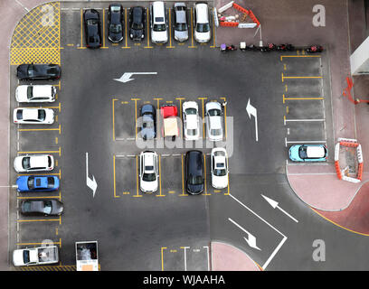 Car parking for light vehicles in Dubai luxury residential district, aerial view Stock Photo