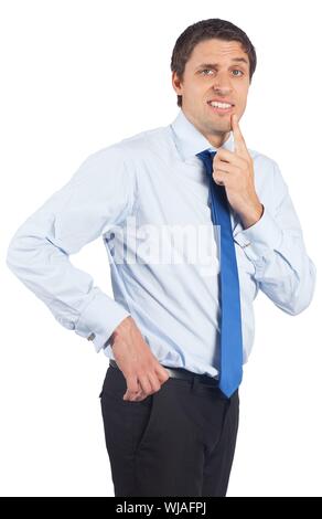 Thinking businessman touching his chin Stock Photo