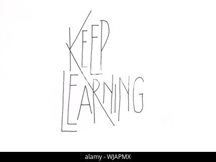 'Keep Learning' hand lettering design in black Stock Photo