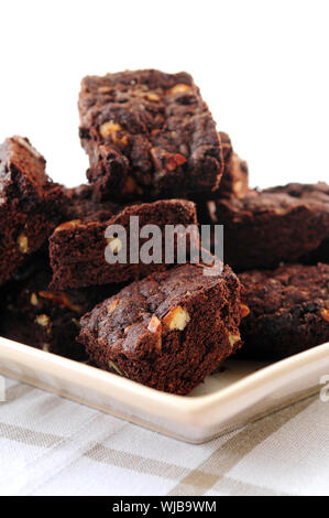 Homemade chocolate brownies served on a plate Stock Photo