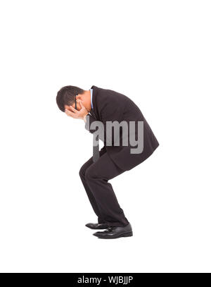 suffering businessman squat to feel disappointment Stock Photo