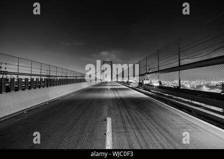 Black and white night view of the Vincent Thomas Bridge in Los Angeles, California. Stock Photo