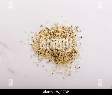 Hemp seeds piled and seen from above Stock Photo