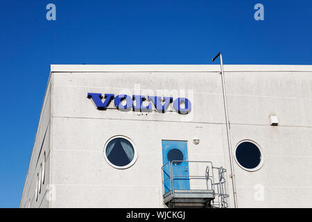 Umea, Sweden - August 2, 2019: part of the Volvo factory with summer blue sky in the background Stock Photo