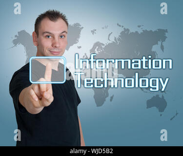 Young man press digital Information Technology button on interface in front of him Stock Photo