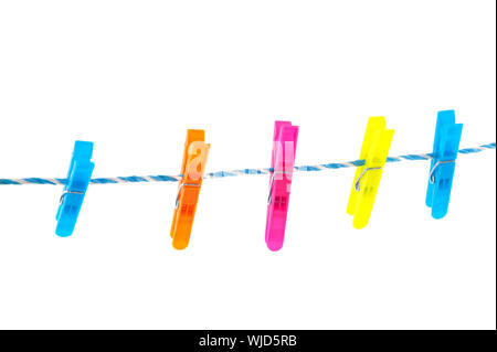 Colorful clothes pins on a laundry rope Stock Photo