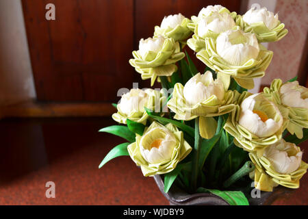 many lotus flower in Ceramic Vase at temple Stock Photo