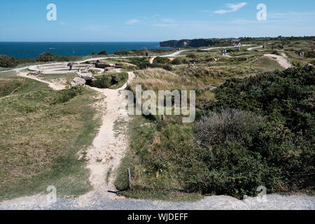 View of Pointe du Hoc with shell craters and bunkers Stock Photo