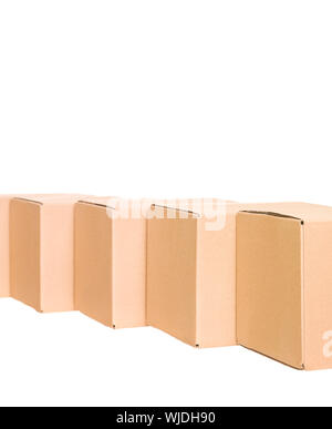 Cardboard boxes in a row isolated on white background Stock Photo