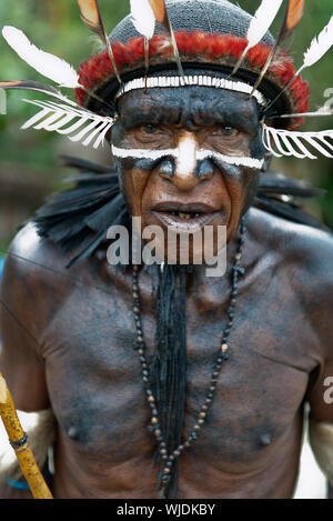 DUGUM DANI VILLAGE, IRIAN JAYA, NEW GUINEA, INDONESIA - JUNE 20: Dugum Dani Warrior Portrait. June 20, 2012 The Baliem Valley Papua or Irian Jaya Indo Stock Photo