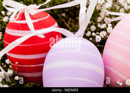 Beautiful Easter eggs in crocheted covers Stock Photo