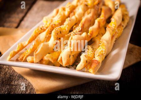 Selective focus in the middle of front homemade sticks with sesame and cumin Stock Photo