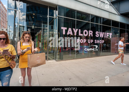 Fans Of Taylor Swift Leave The Taylor Swift Pop Up Shop In