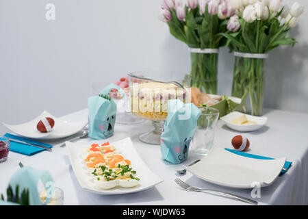 Traditional, polish Easter table with colored eggs, boiled eggs Stock Photo