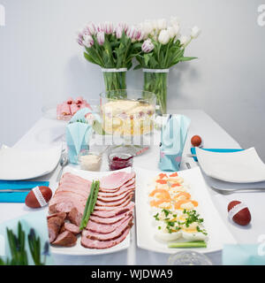 Traditional, polish Easter table with colored eggs, boiled eggs Stock Photo