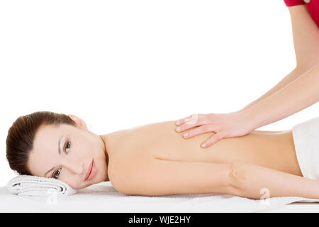 Preaty woman relaxing beeing massaged in spa saloon Stock Photo