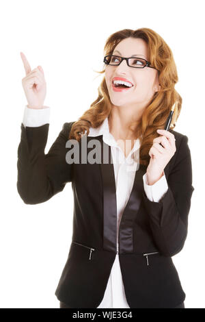 Happy business woman showing copy space, isolated on white Stock Photo