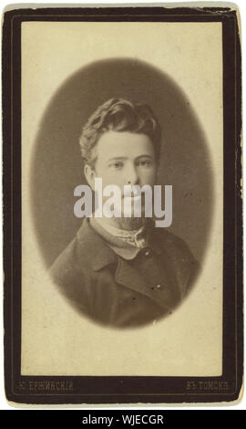 Head-and-shoulders portrait of man, facing slightly right Stock Photo