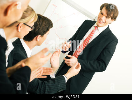 Business presentation: applause Stock Photo